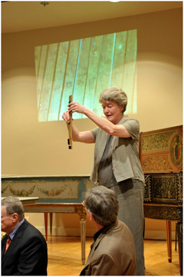 Barbara Wolf shows one of the Boni’s split sharps, which allow  enharmonically equivalent notes (such as D-sharp and E-flat) to be tuned to different pitches.
